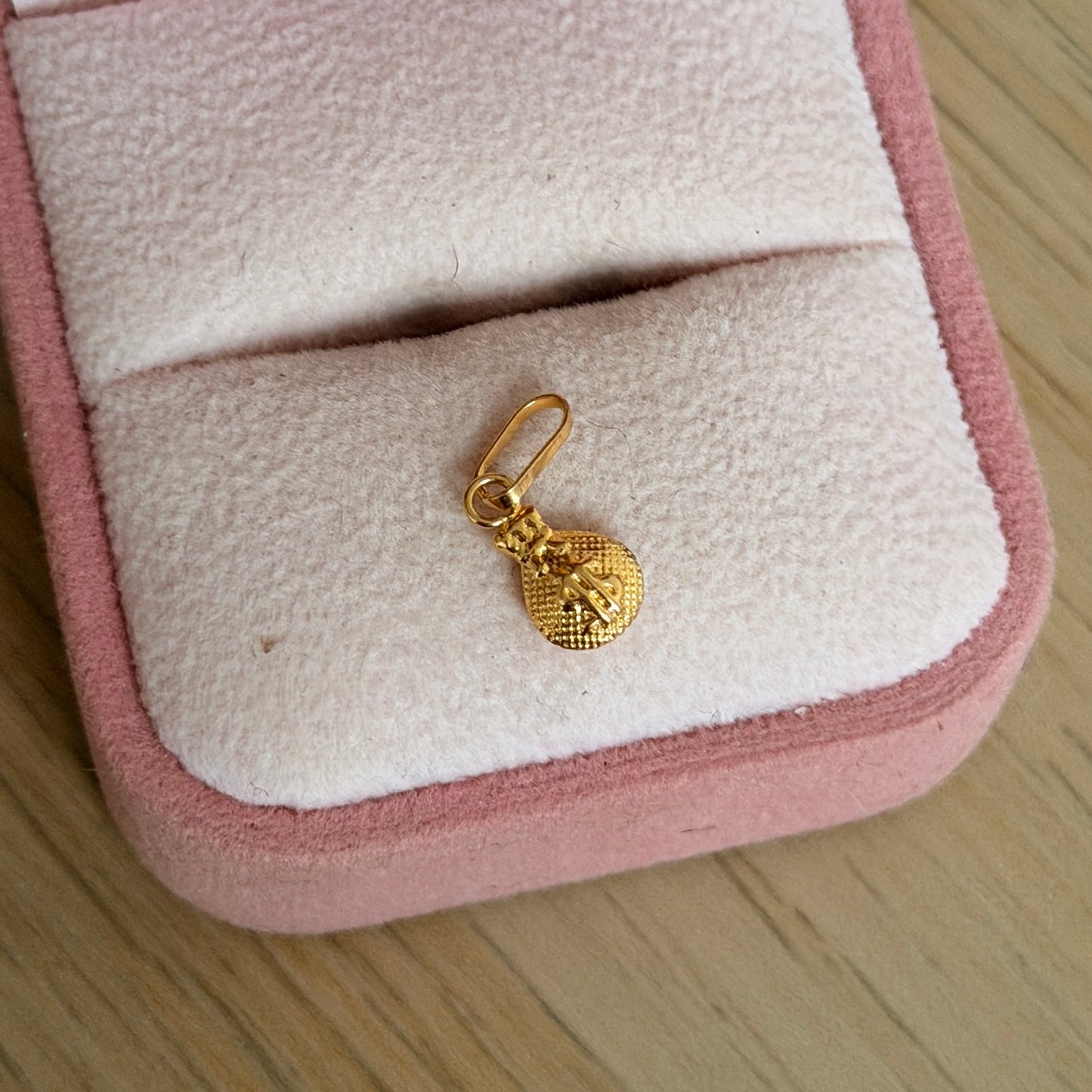 DIJE BOLSA DE DINERO DIAMANTADA 1.2CM ORO AMARILLO COL 18K - 0,28GR