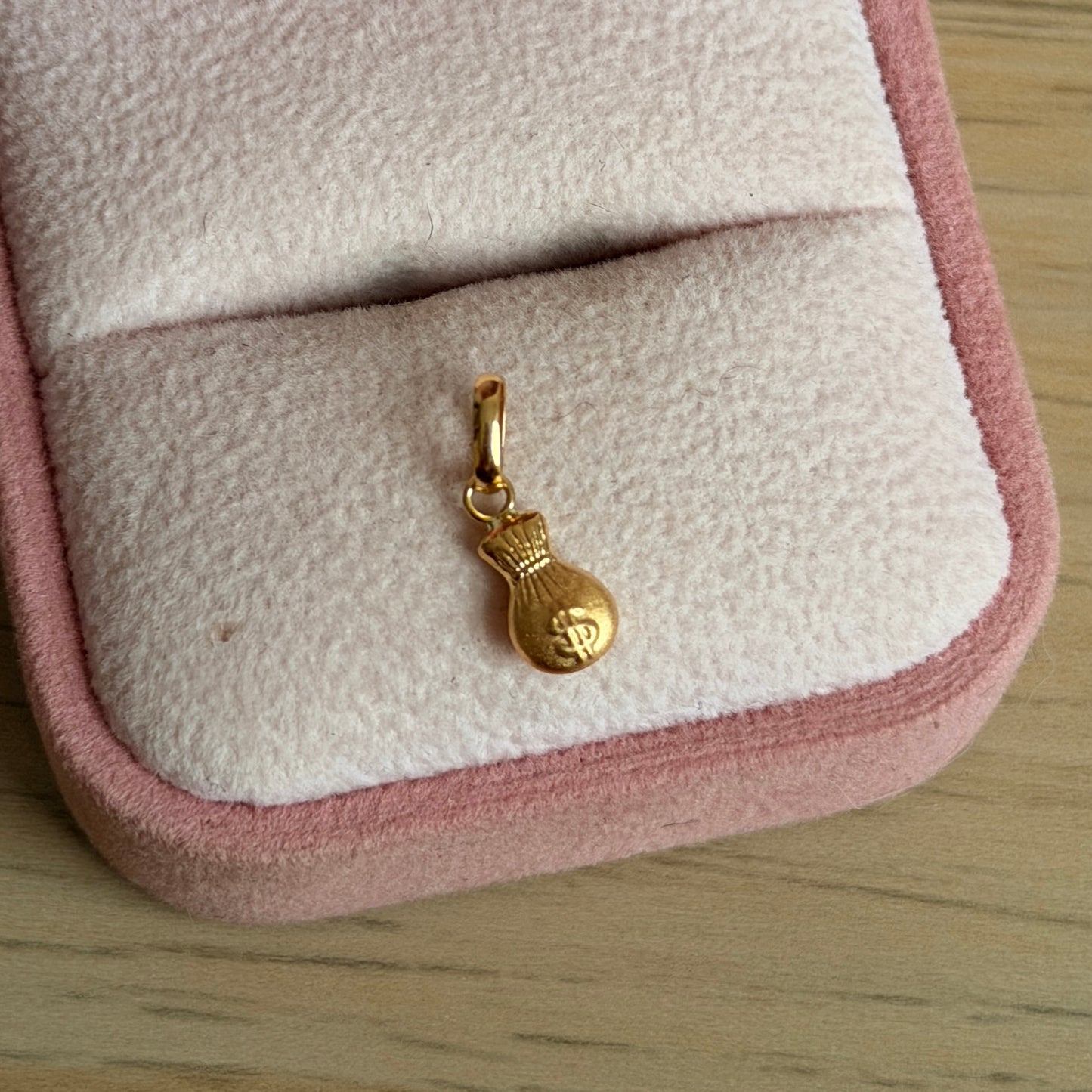 DIJE BOLSA DE DINERO 1.3CM ORO AMARILLO COL 18K - 0,28GR