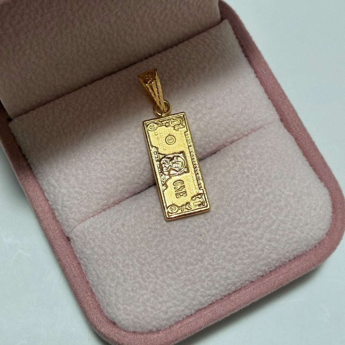 DIJE DOLAR 2.7CM ORO AMARILLO COL 18K-1.05GR