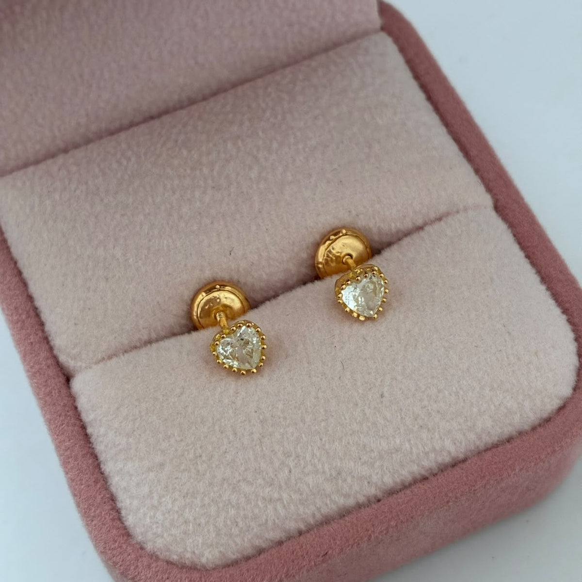 TOPOS CORAZON+PIEDRA BLANCA 1GR 5MM ORO AMARILLO COL 18K