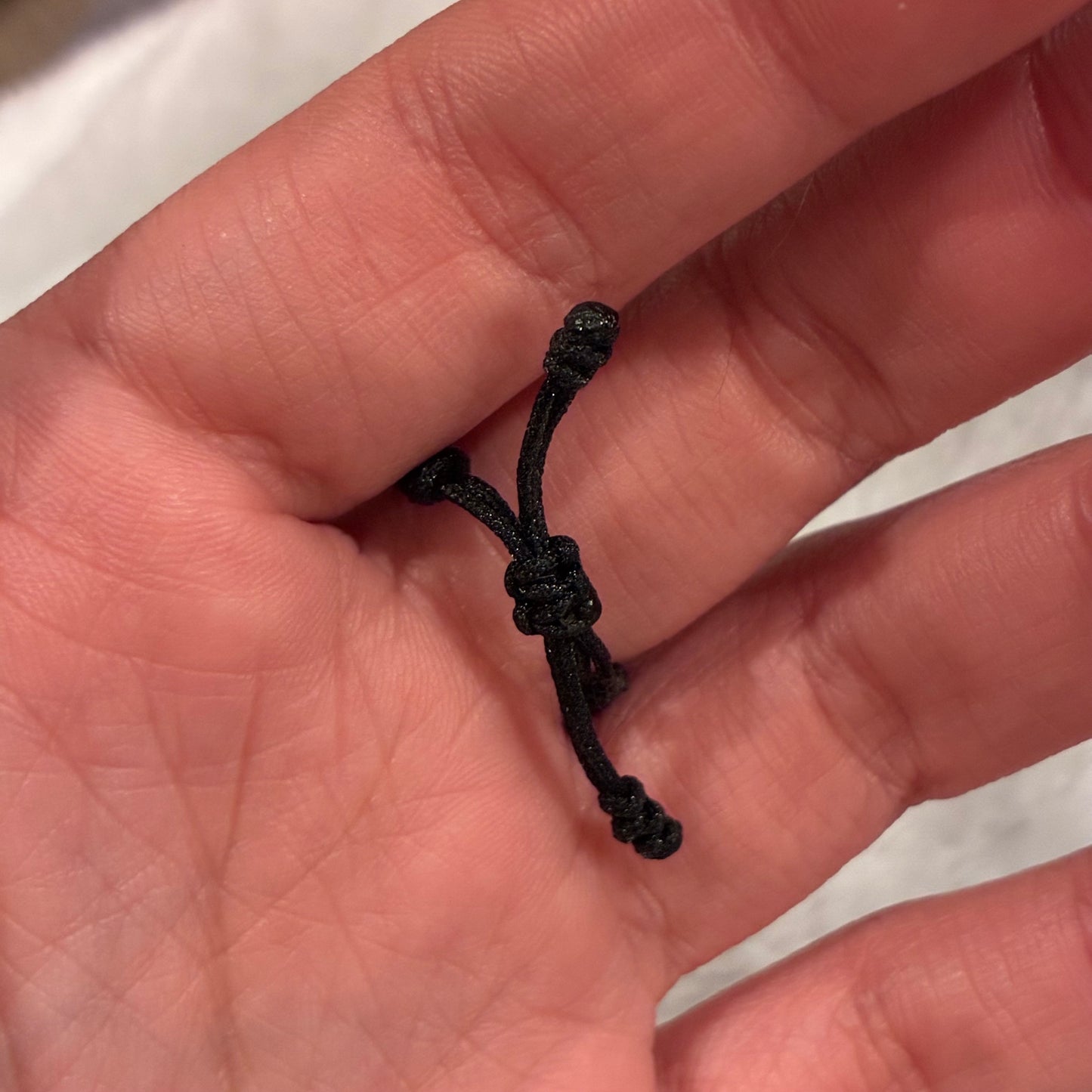 ANILLO HILO NEGRO CORONA RX + 6 BOLAS LISAS 3M ORO AMARILLO 18K - 0,53GR