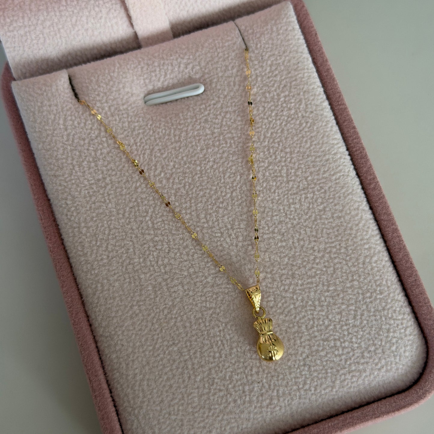 CADENA MINI CRISPETA 0.9MM 45CM + DIJE BOLSA DE DINERO ORO AMARILLO 18K 0,6GR (ND)