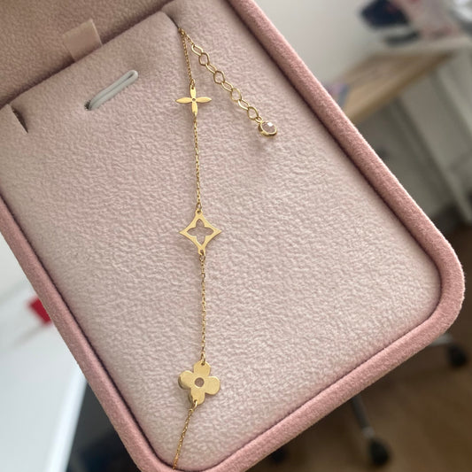 PULSERA FLOR + ESTRELLA 0,5MM ORO ITALY ESP 18K 17CM A 19CM - 1,29GR (IK)