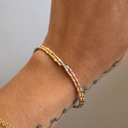 PULSERA CILINDROS DIAMANTADOS ESTILO RESORTE 2MM TRES OROS ITALY 18K 17CM - 5,82GR