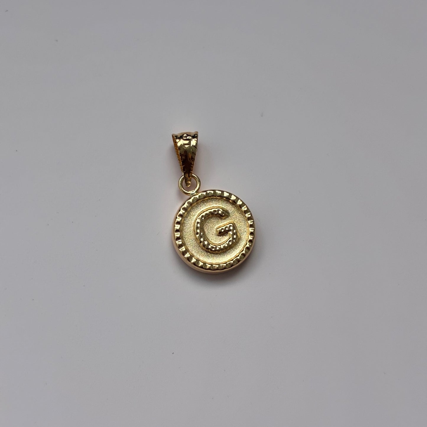 DIJE LETRA G REDONDO BORDEADO 1,7CM ORO AMARILLO 18K - 0,6GR