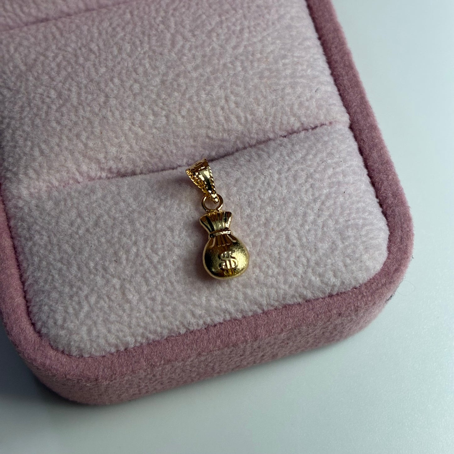 DIJE BOLSA DE DINERO 1.5CM ORO AMARILLO COL 18K - 0,29GR (NH)