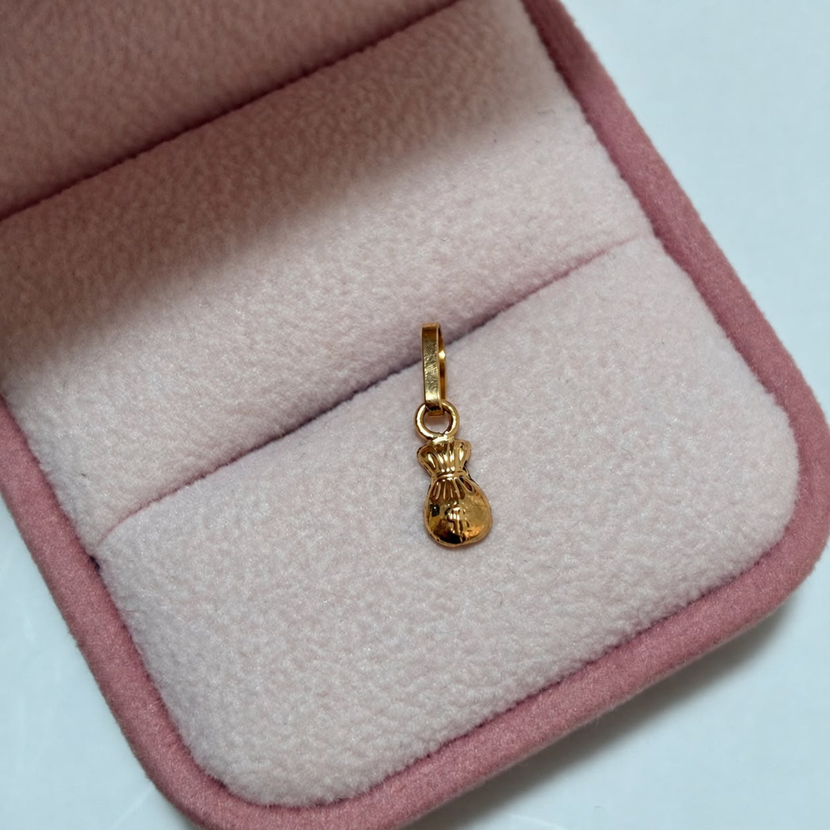 DIJE BOLSA DE DINERO 1.5CM ORO AMARILLO COL 18K-0.38GR