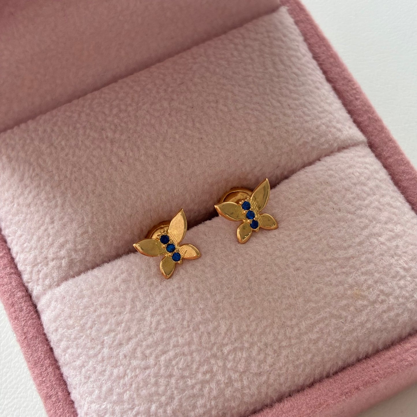 TOPOS MARIPOSA PIEDRAS AZULES 5.7MM ORO AMARILLO 18K - 0,81GR *PP*