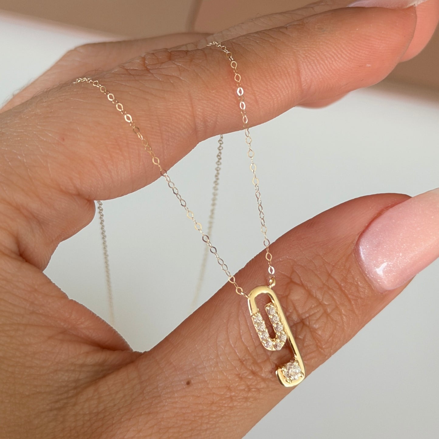 CADENA MINI ROLON + DIJE PIEDRAS BLANCAS ORO AMARILLO ITALY ESP 18K  40CM - 0,63GR (IA)