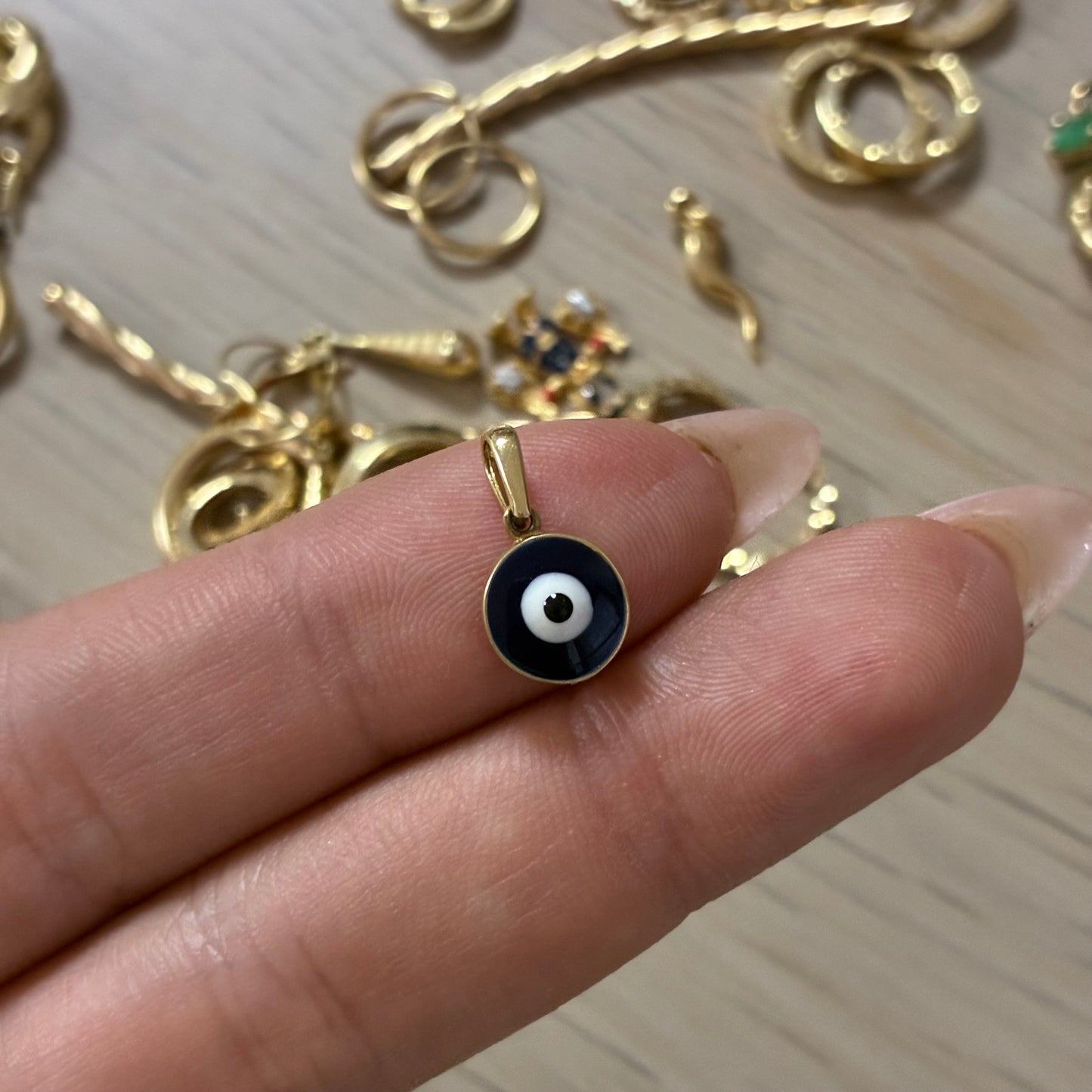 DIJE OJO TURCO 1.5CM ORO AMARILLO COL 18K - 1,02GR (NB)