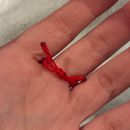 ANILLO HILO ROJO CORONA RX + 6 BOLAS DIAMANTADAS 3M ORO AMARILLO 18K - 0,58GR