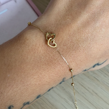 PULSERA MINI FRANCO 0.6MM + DIJE CORAZON ABRAZADOS Y BOLAS LISAS ORO AMARILLO ITALY ESP 18K 17CM A 19CM - 0,82GR