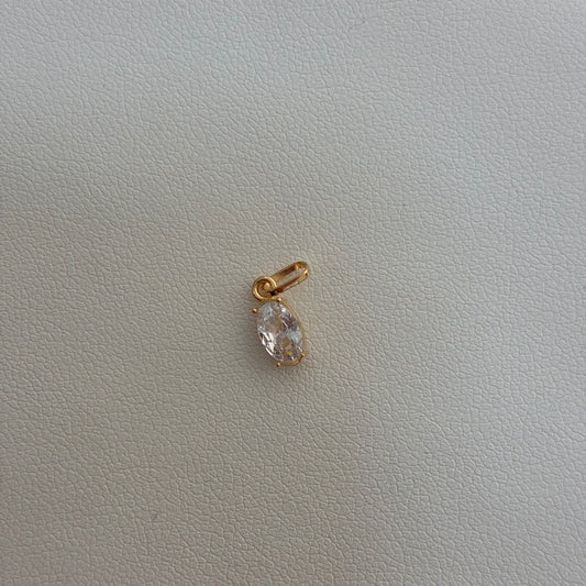 DIJE PIEDRA BLANCA OVALADA 1.3CM ORO AMARILLO 18K - 0.32GR