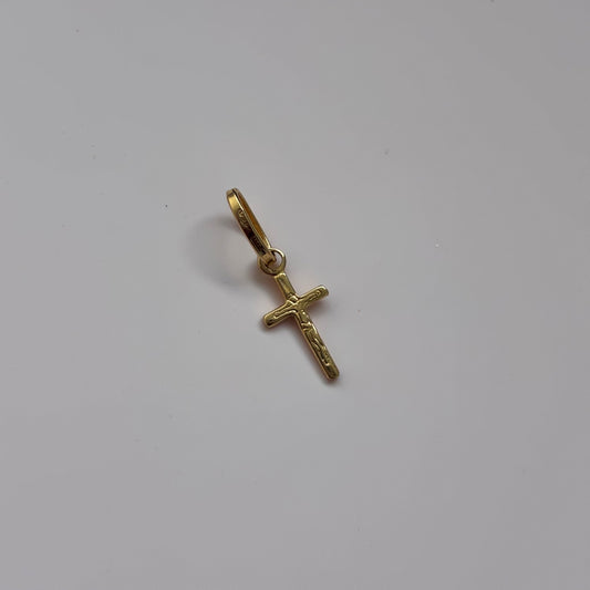 DIJE CRUZ CON CRISTO 1.3CM ORO AMARILLO 18K - 0,45GR