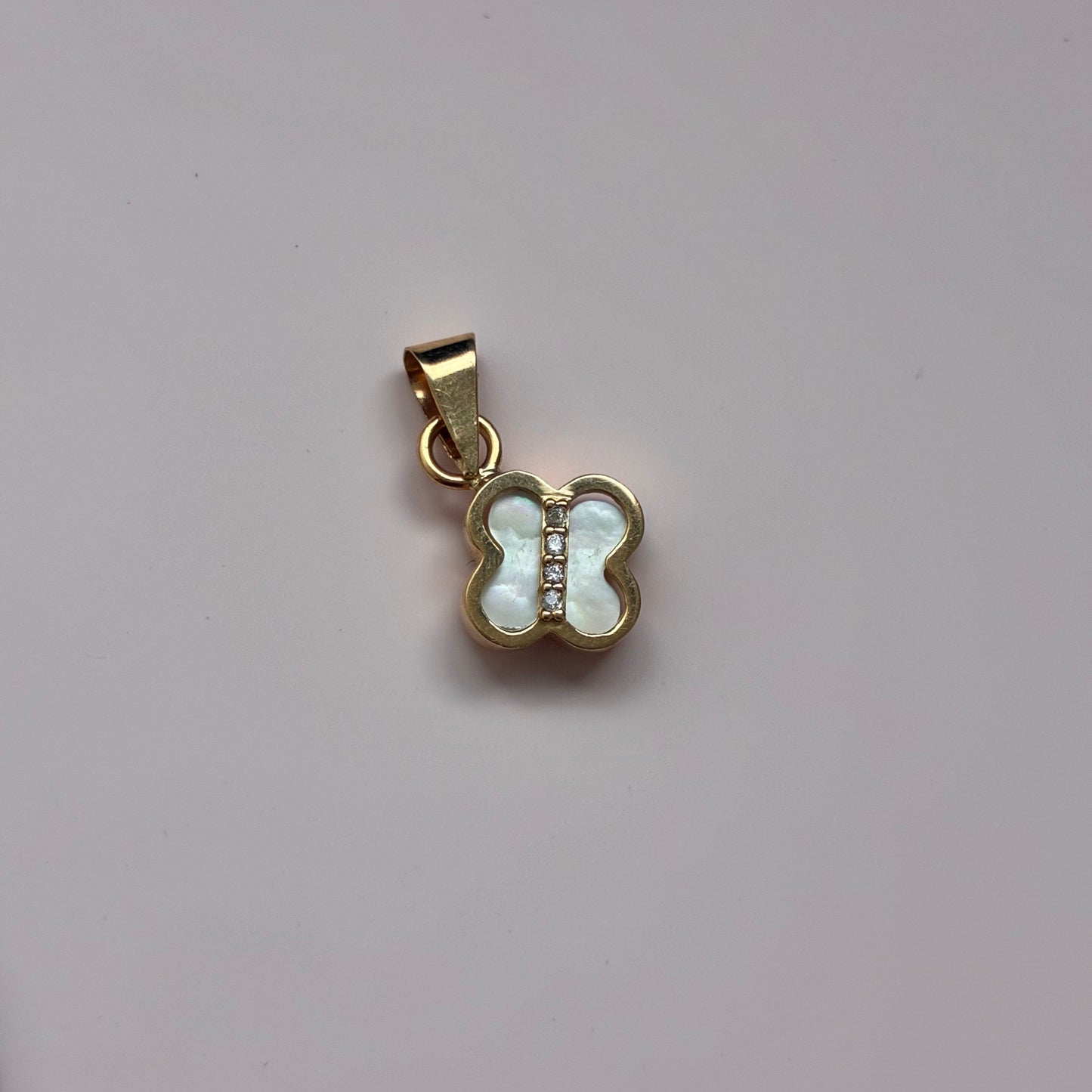 DIJE TREBOL PIEDRA BLANCA Y PIEDRAS BLANCAS 1CM ORO AMARILLO 18K - 1,0GR