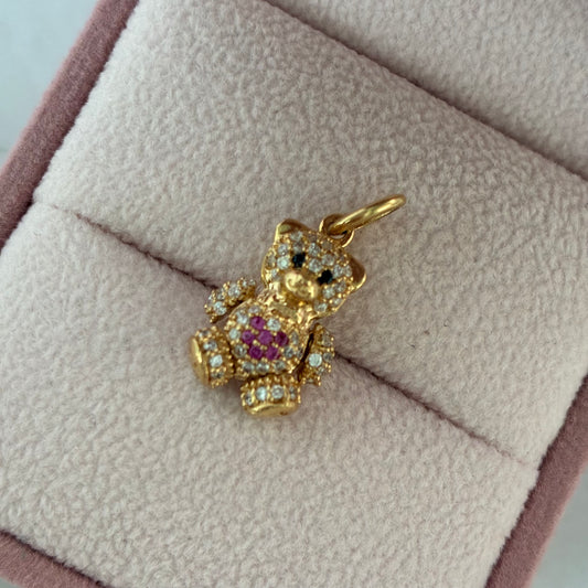 DIJE MINI OSO ARTICULADO PIEDRAS BLANCAS Y CORAZON FUCSIA - OJOS NEGROS 1.9CM ORO AMARILLO COL 18K -2,5GR (NE)